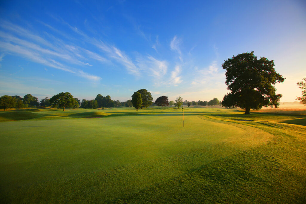 Hole with trees around at Mottram Hall Golf Course