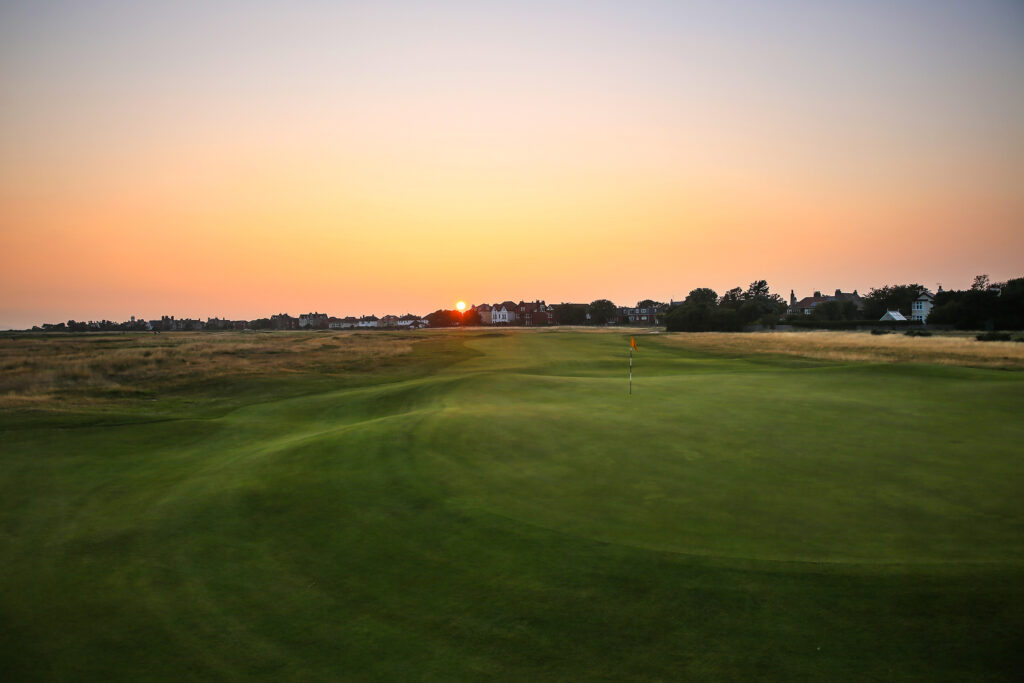 Hole with yellow flag at Royal Liverpool Golf Club