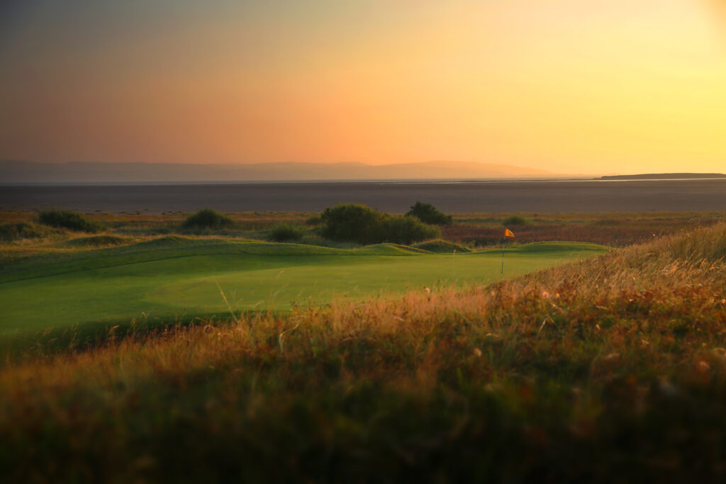 Hole with red flag at Royal Liverpool Golf Club