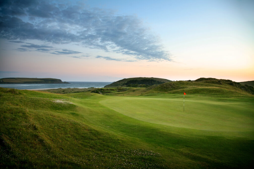 Hole with red flag at St Enodoc Golf Club - Church Course