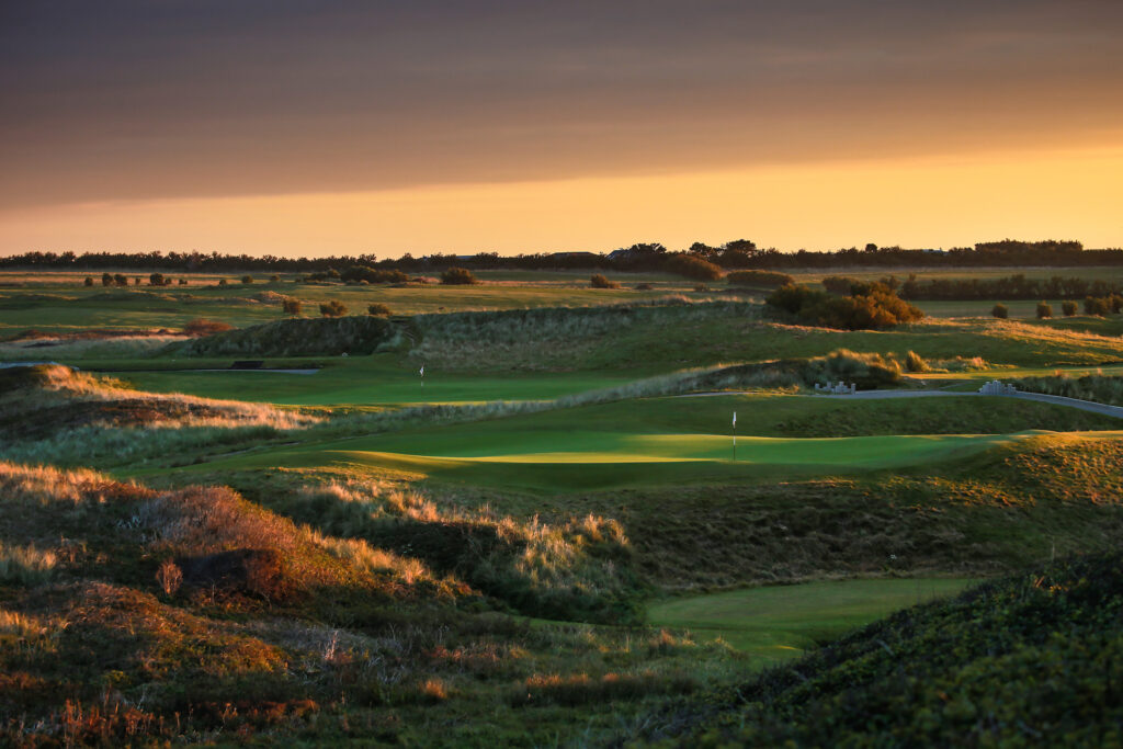 View of fairway with holes and mounds at Championship Course at Trevose Golf & Country Club