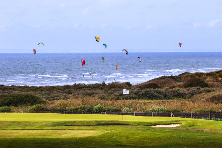 Hole with kites in background at Wimereux Golf Course