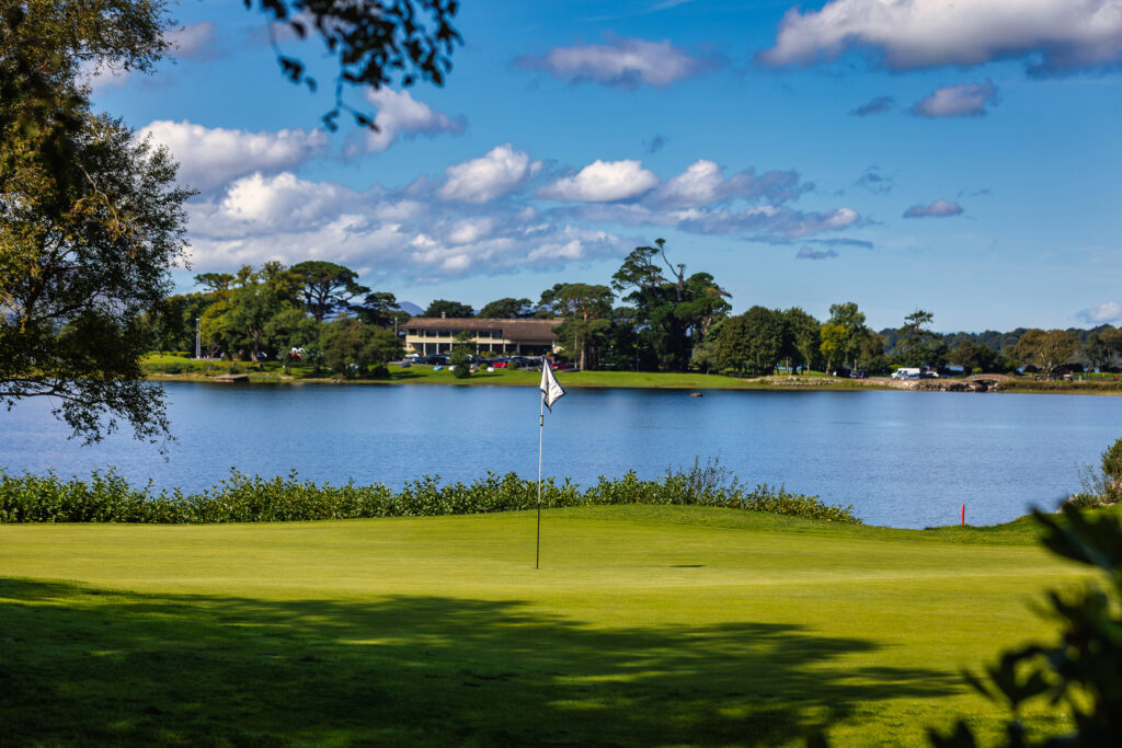 Hole at Killarney Golf & Fishing Club - Killeen Course with lake view