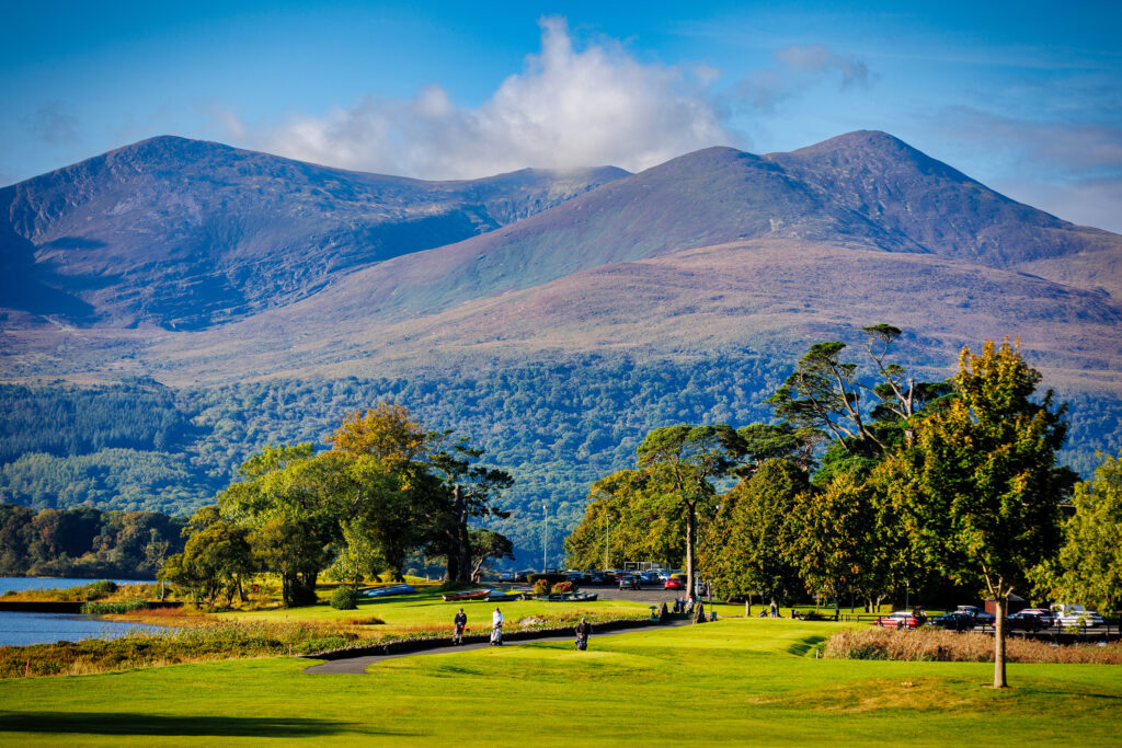 People playing golf at Killarney Golf & Fishing Club - Killeen Course with hills in background