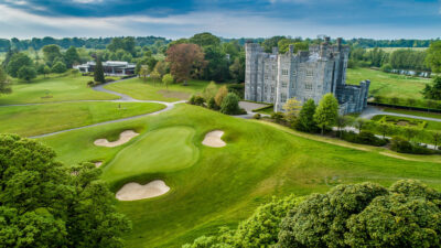 Hole with bunkers at Killeen Castle Golf Club with castle in view