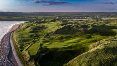 Aerial view of Lahinch Golf Club with beach in view