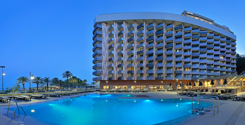 Exterior of Melia Costa Del Sol with pool at night