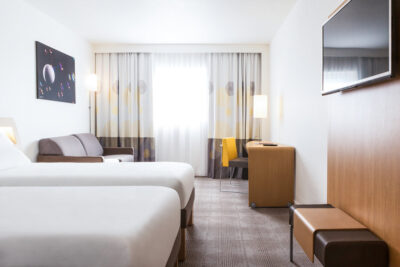 Twin bed accommodation at Novotel Saint Quentin en Yvelines