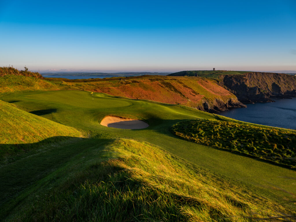 Hole with bunker at The Suites at Old Head Golf Links with ocean view