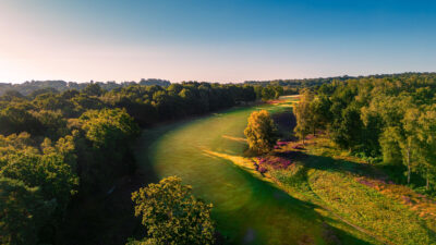 Aerial view of the fairway at Royal Ashdown Forest - Old Course with trees around