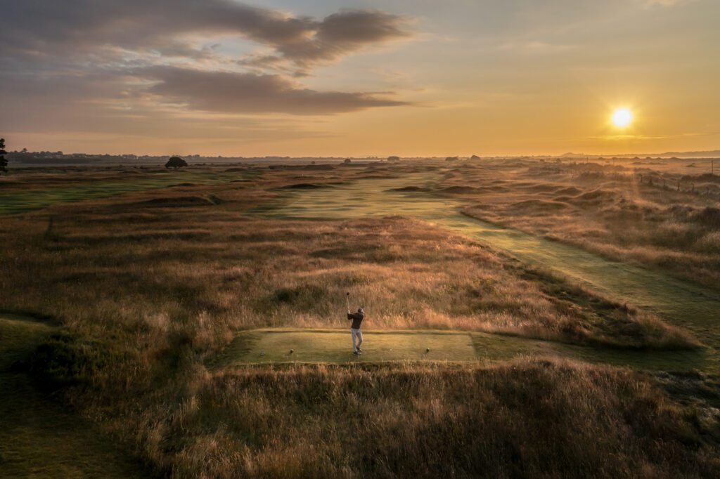 Person teeing off at Royal Dublin Golf Club