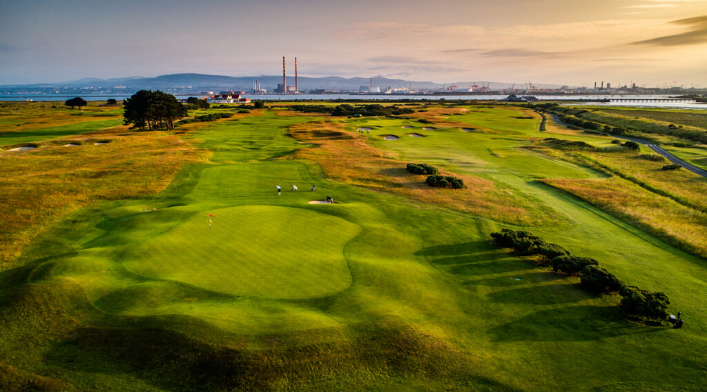 Aerial view of Royal Dublin Golf Club with people playing