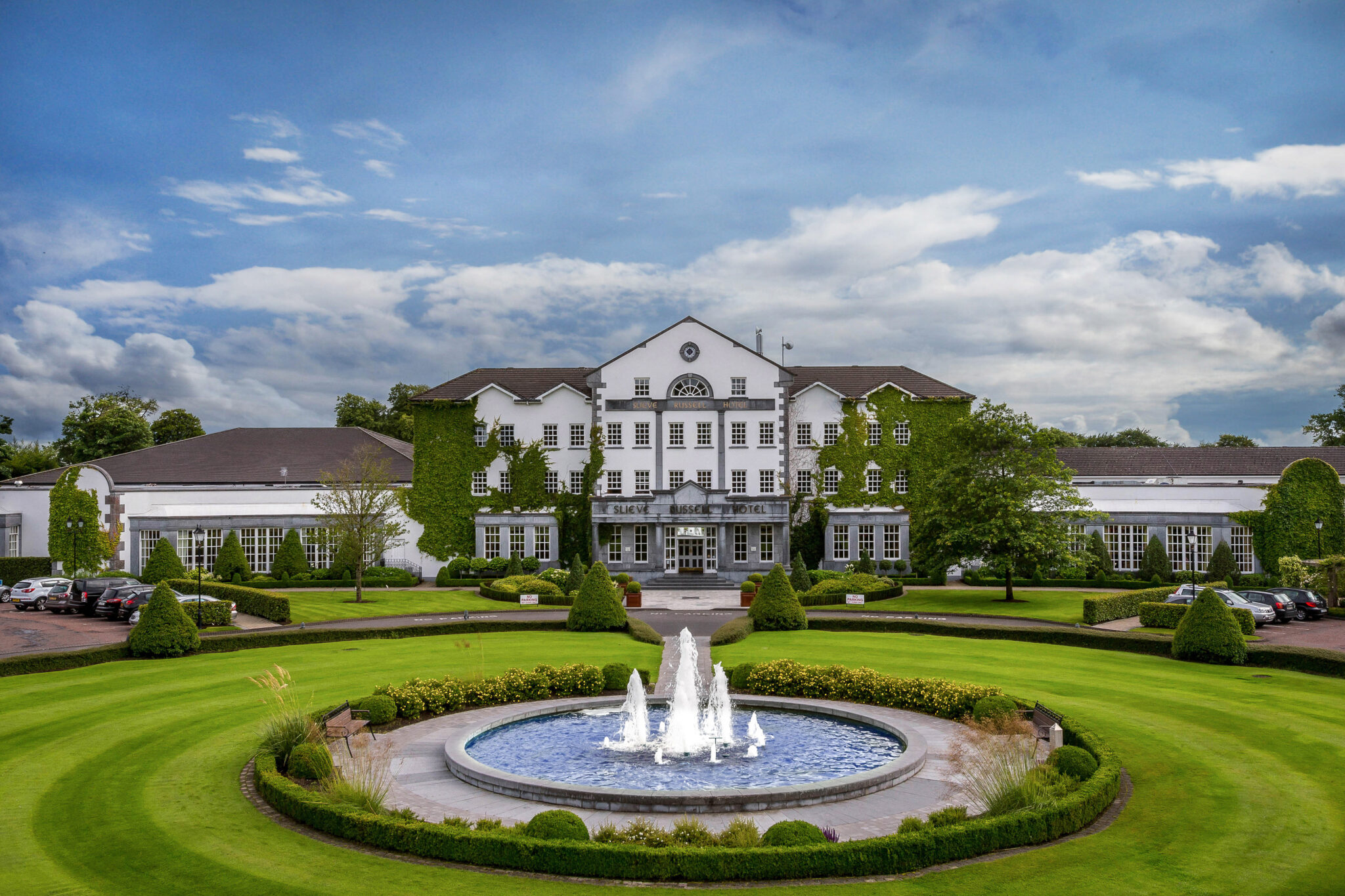 Exterior of Slieve Russell Hotel Golf & Country Club with a water fountain