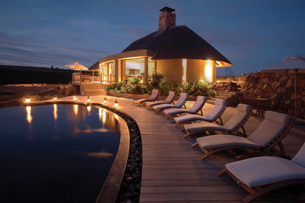 Poolside night view at Lehele Lodge in South Africa