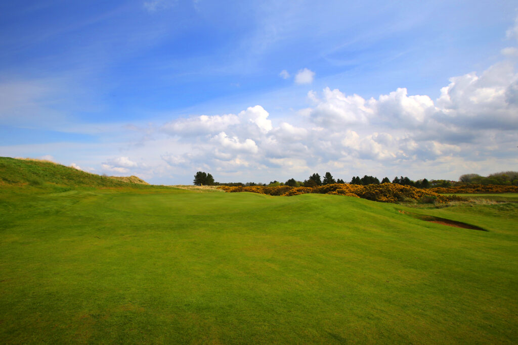 Fairway at Southport & Ainsdale with trees in distance