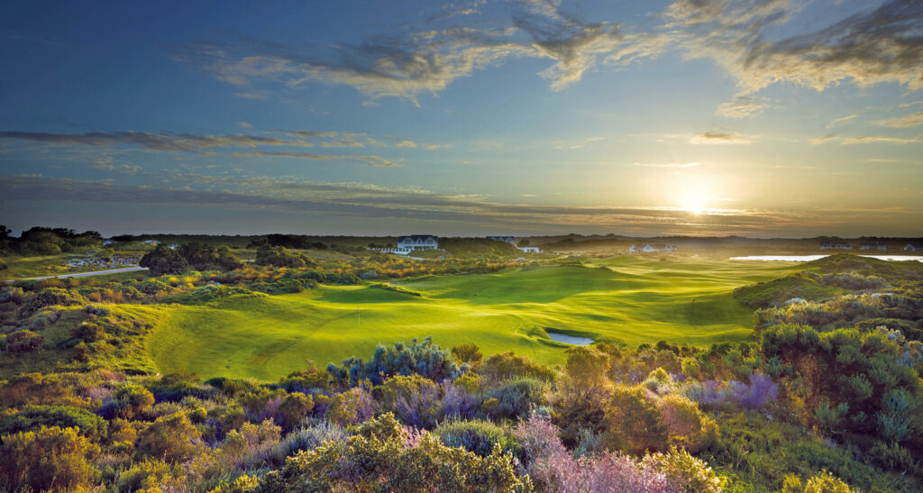 Fairway at St Francis Links Golf Club with buildings in distance