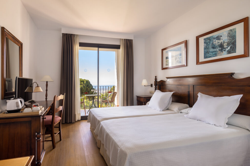 Twin bed accommodation at Hotel TRH Mijas