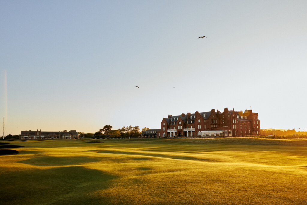 Exterior of The Marine Hotel Troon with fairway in foreground