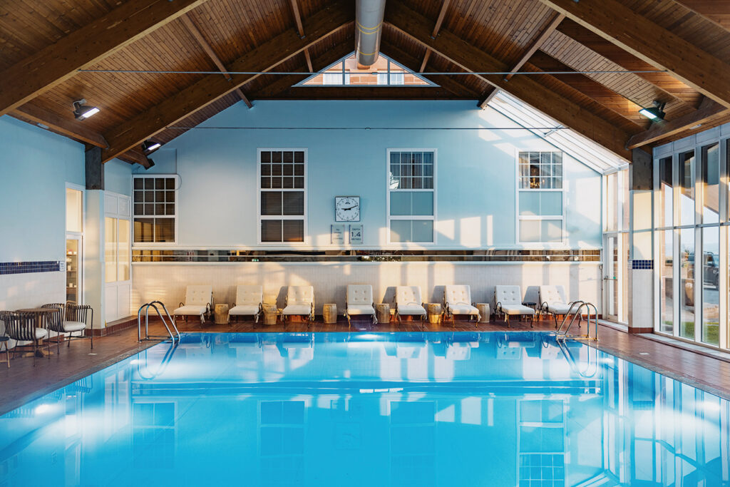 Indoor pool at The Marine Hotel Troon with loungers