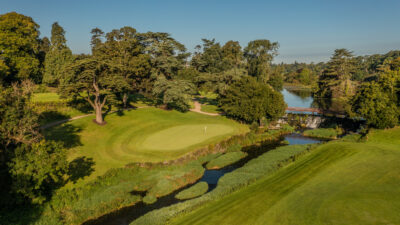 Hole with river running next to it at The O'Meara at Carton House with trees all around