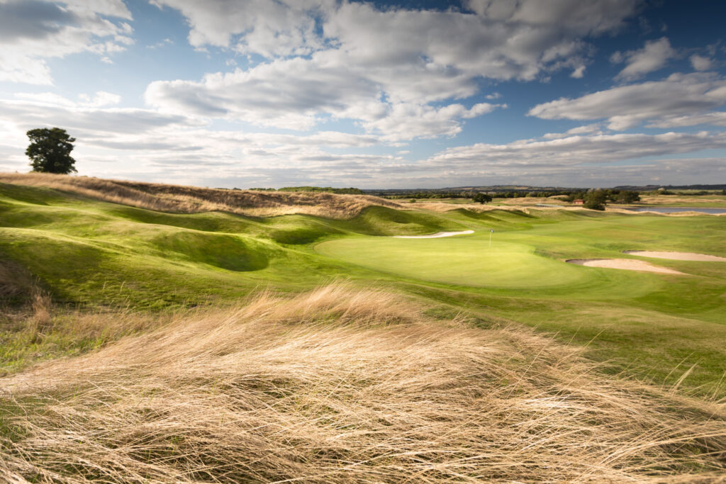 Fairway and hole with bunkers around at The Oxfordshire