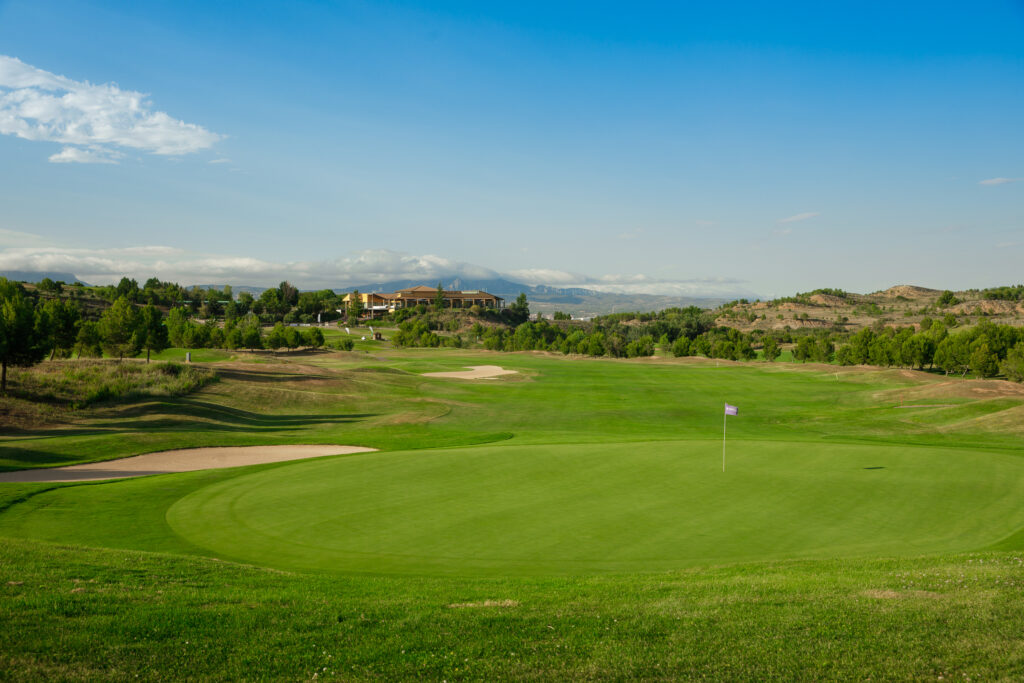 Hole with bunker and trees around at Campo de Golf Logrono