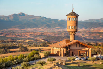 Exterior of Hotel Eguren-UGarte with mountains in distance