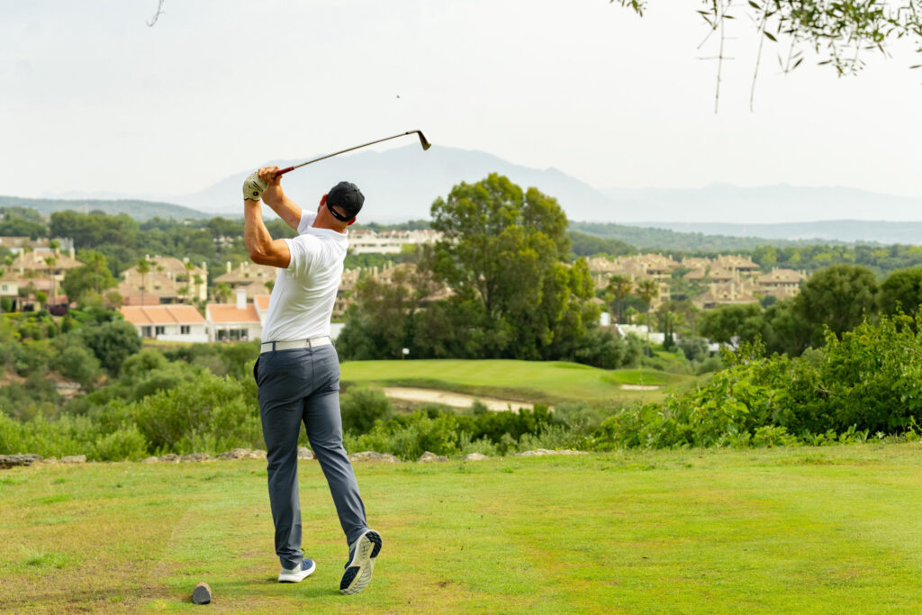 Person playing golf at San Roque Golf & Resort