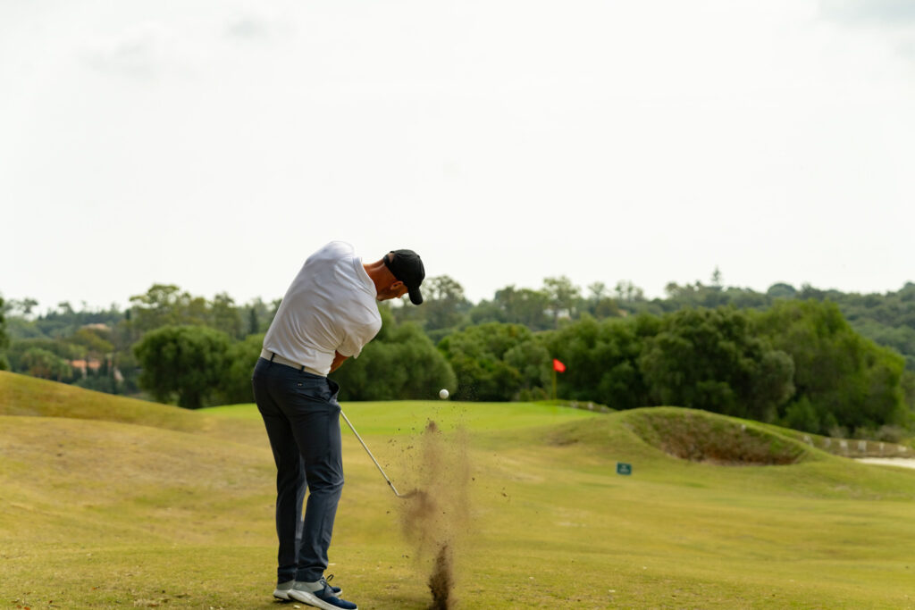 Person playing golf at San Roque Golf & Resort